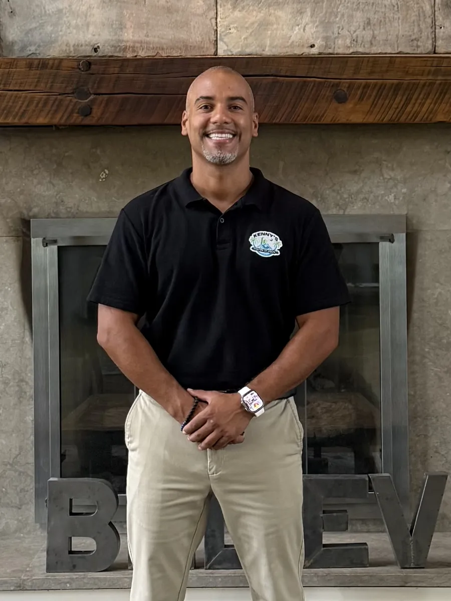 Kenny Duran, founder of Kenny's Pristine Detailing, wearing a KPD polo.